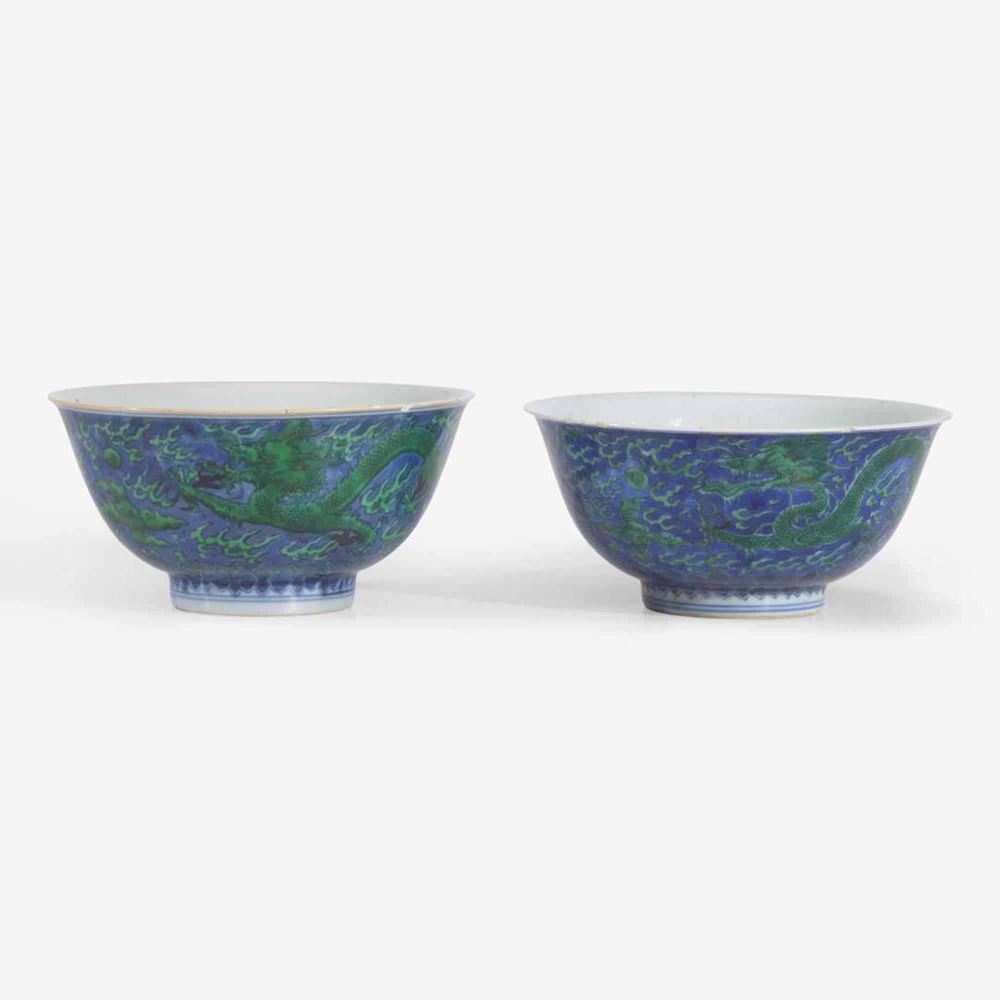 An associated pair of Chinese underglaze blue and green-enameled dragon bowls 珐琅彩青花龙纹碗一对 Kangxi six-character mark and of the period ????? ???