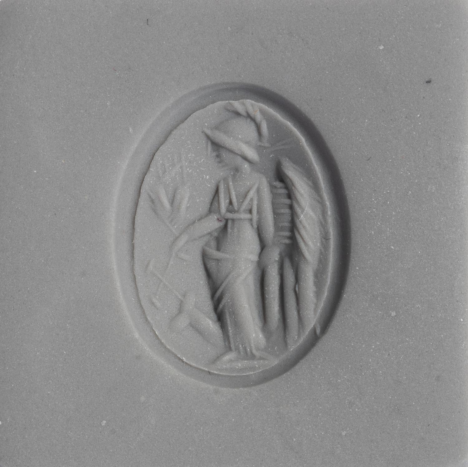 A Roman Carnelian Ring Stone with the Goddess Minerva — Set in a gold ring