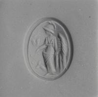 A Roman Carnelian Ring Stone with the Goddess Minerva — Set in a gold ring