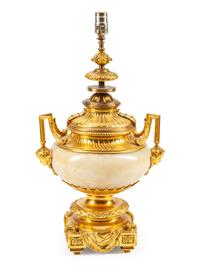 A Louis XVI Style Gilt Bronze Mounted Alabaster Urn