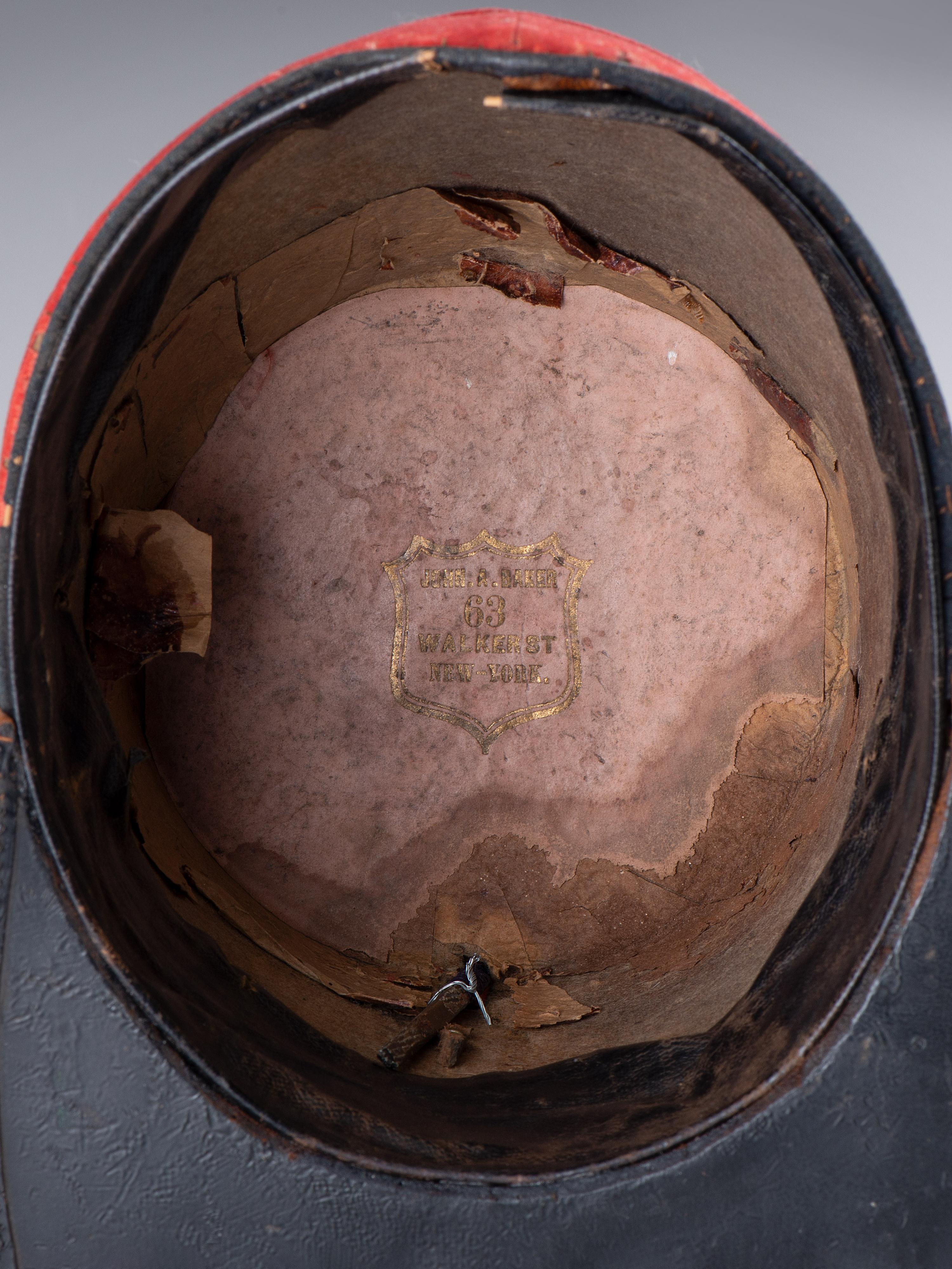 [CIVIL WAR]. Artillery shako, attributed to the Brooklyn Light Artillery. Manufactured by John A. Baker, New York.