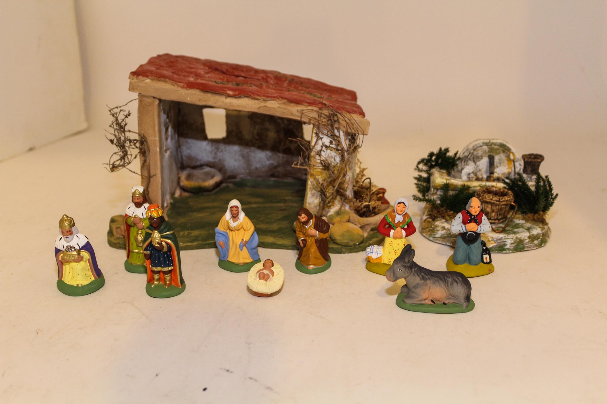 A French Painted Ceramic Nativity Scene Height of barn 6 inches. — 20TH CENTURY