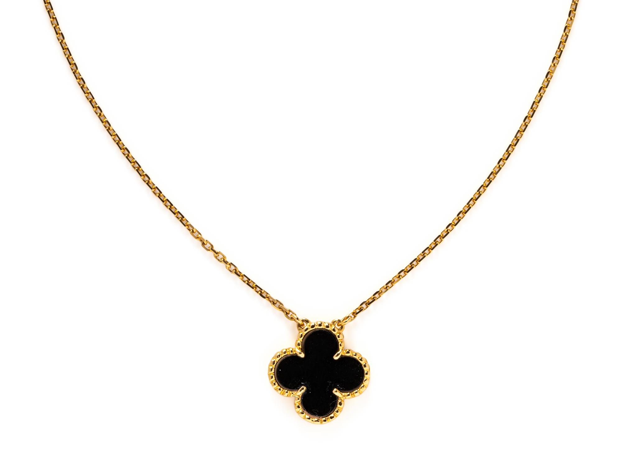 VAN CLEEF & ARPELS, YELLOW GOLD AND ONYX 'ALHAMBRA' PENDANT/NECKLACE