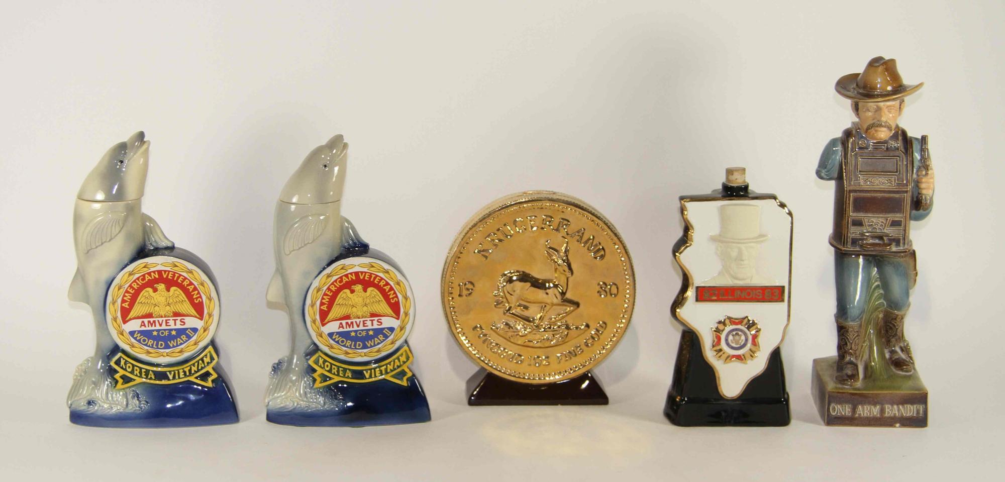 A Group of Nine Haeger Pottery Liquor Bottles