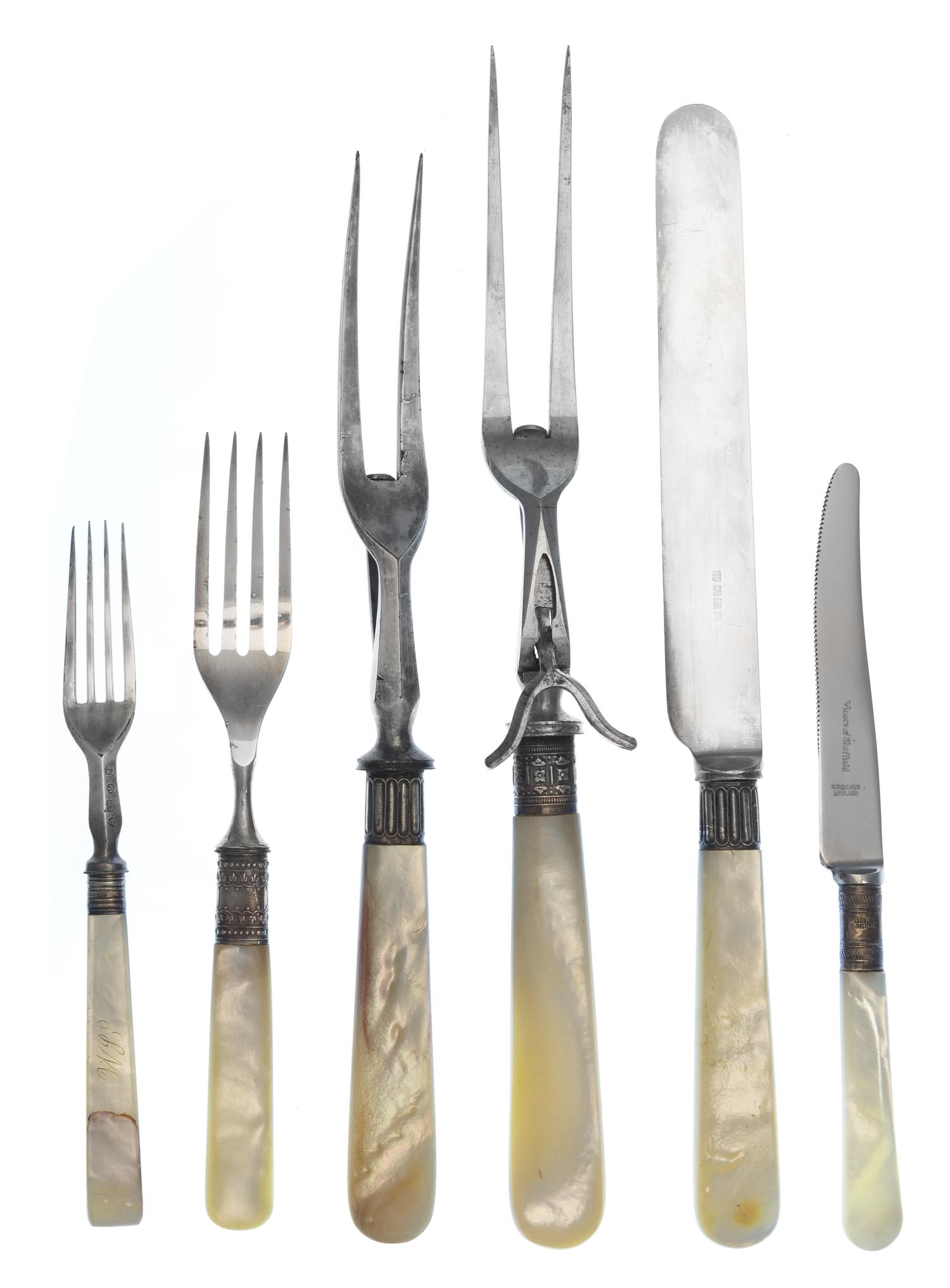 A Collection of Mother-of-Pearl Handled Flatware, , comprising: 2 carving forks 1 carving knife 12 luncheon forks 1 dessert knife 8 fis