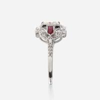 A diamond, ruby, and eighteen karat white gold ring