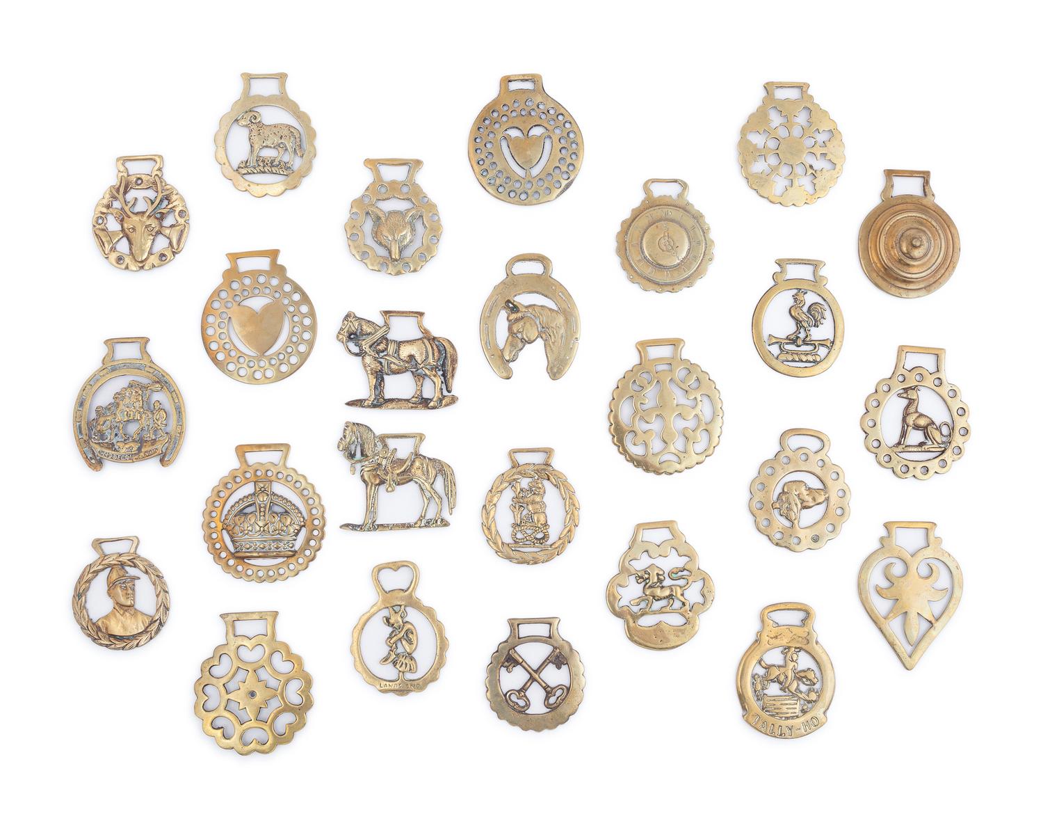 A Collection of Twenty Five Pressed and Cast Brass Buckles