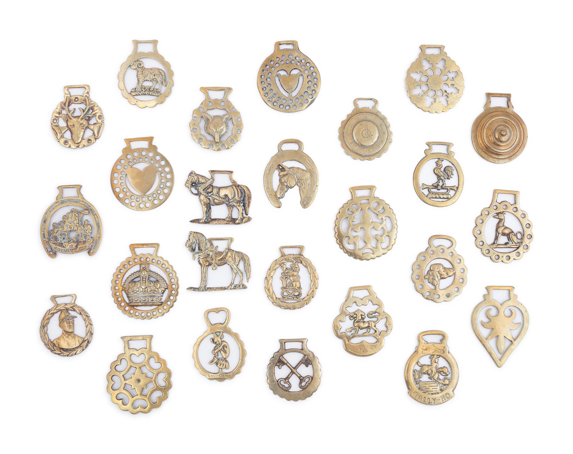 A Collection of Twenty Five Pressed and Cast Brass Buckles