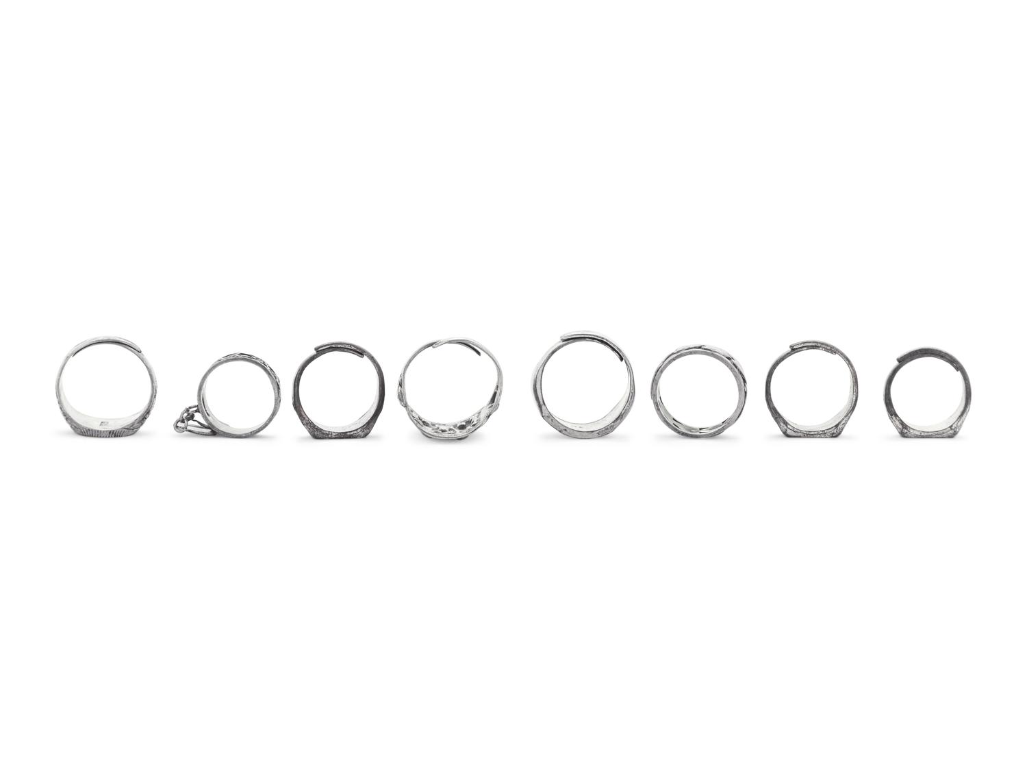 Eight Chinese Silver and Metal Rings