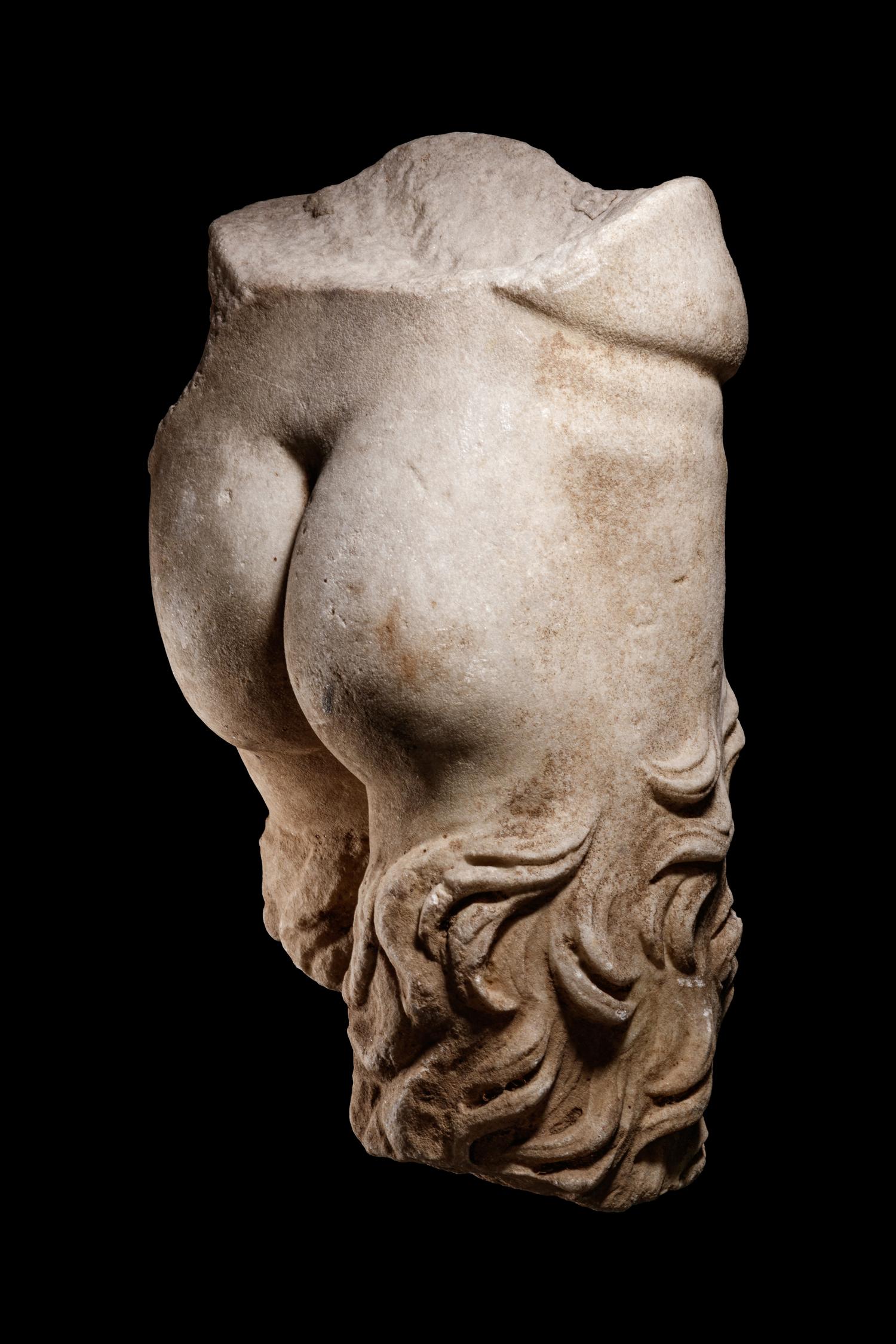 A Roman Marble Lower Torso of a Satyr