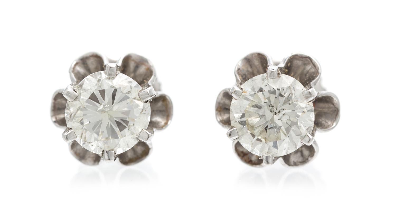 A Pair of White Gold and Diamond Stud Earrings, 1.30 dwts.