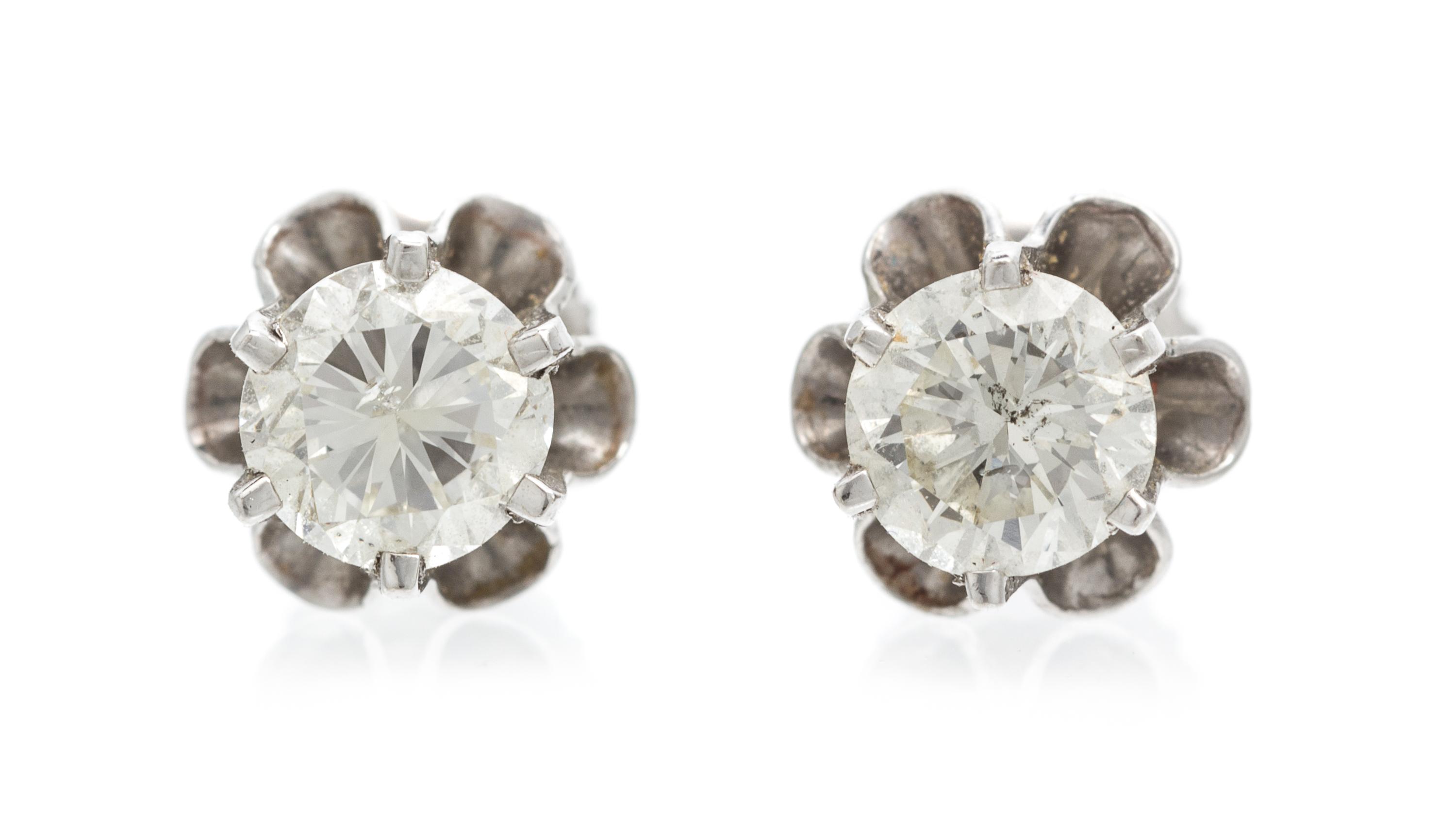 A Pair of White Gold and Diamond Stud Earrings, 1.30 dwts.