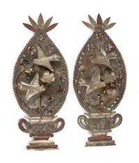 A Pair of Punched and Painted Tin Outdoor Decorations