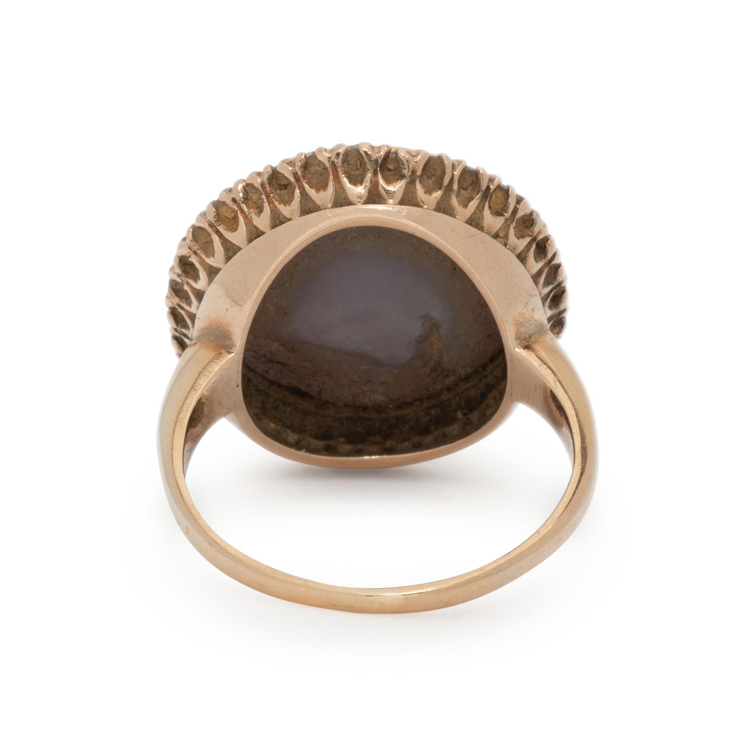 YELLOW GOLD, STAR SAPPHIRE, AND DIAMOND RING