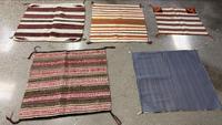 A Group of Single Saddle Blankets