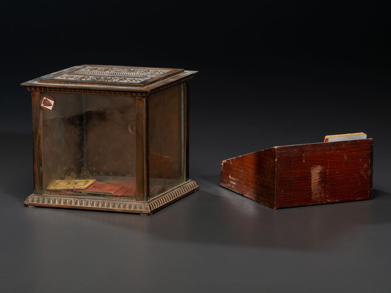 A National Cash Register Embossed Brass and Glass Ticket Receipt Box