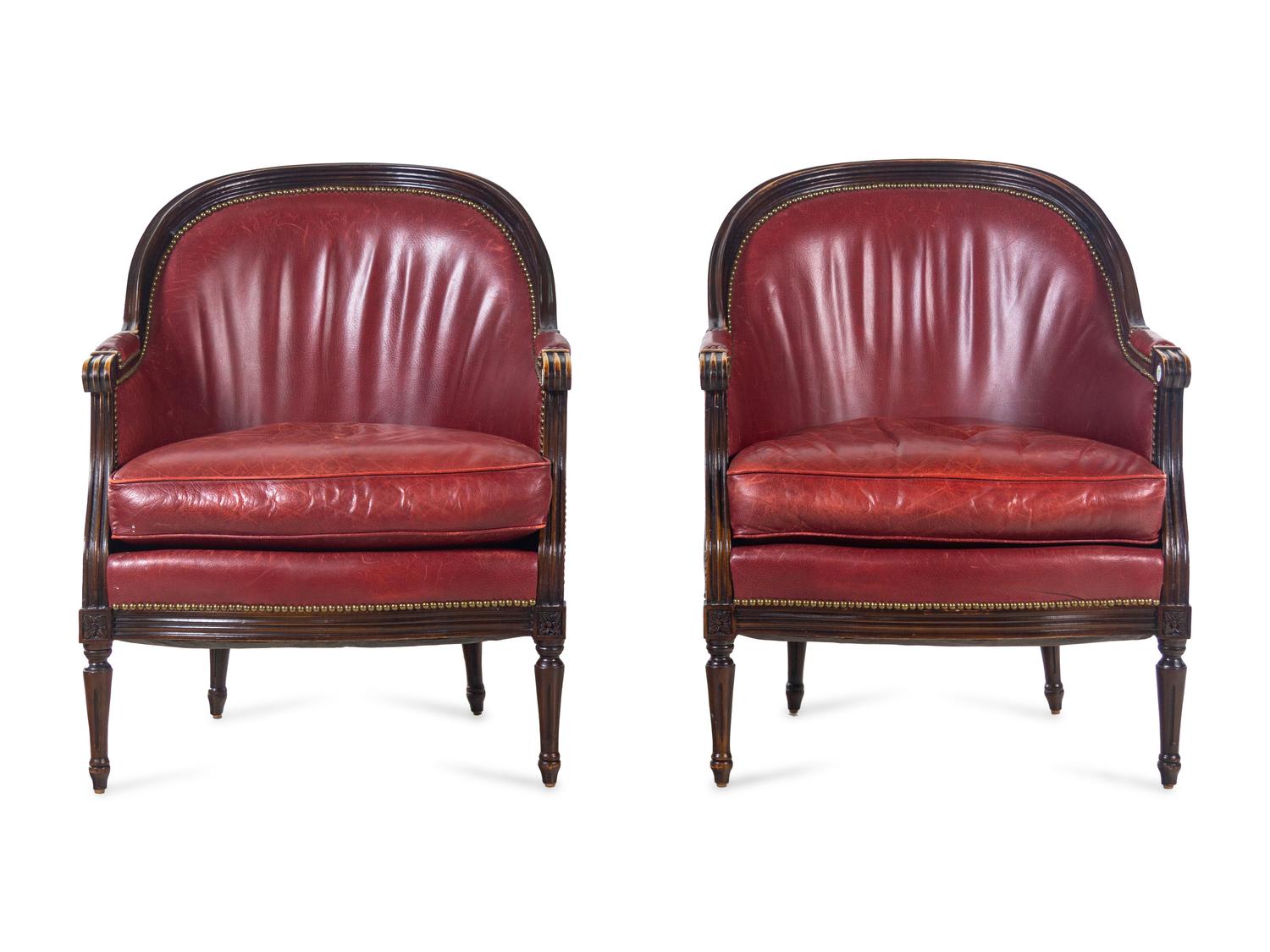 A Pair of Edwardian Style Carved Mahogany Barrel-Back Bergères