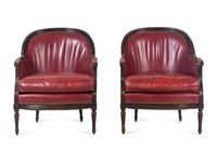 A Pair of Edwardian Style Carved Mahogany Barrel-Back Bergères