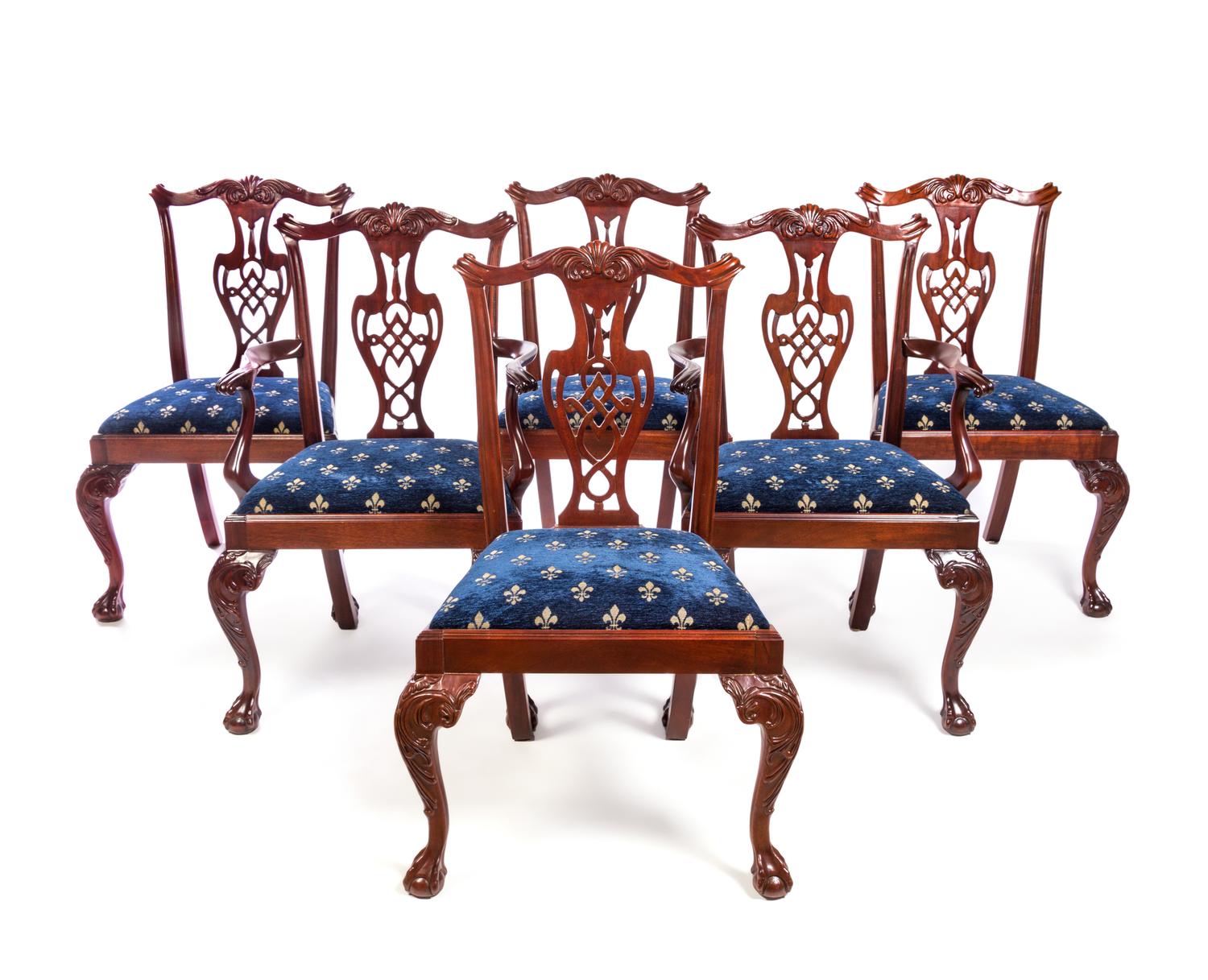 A Set of Ten Chippendale Style Mahogany Dining Chairs Height 38 1/2 inches. — 20TH CENTURY