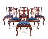 A Set of Ten Chippendale Style Mahogany Dining Chairs Height 38 1/2 inches. — 20TH CENTURY