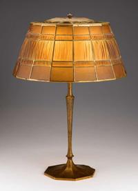 "Favrile Fabrique" leaded glass and gilt bronze table lamp tiffany studios, new york, ny, early 20th century