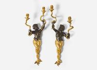 A large pair of Louis XVI style gilt and patinated bronze wall sconces depicting mermen, late 19th century