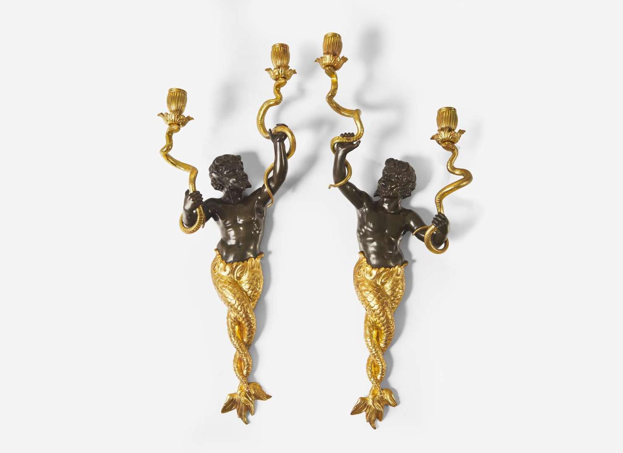 A large pair of Louis XVI style gilt and patinated bronze wall sconces depicting mermen, late 19th century