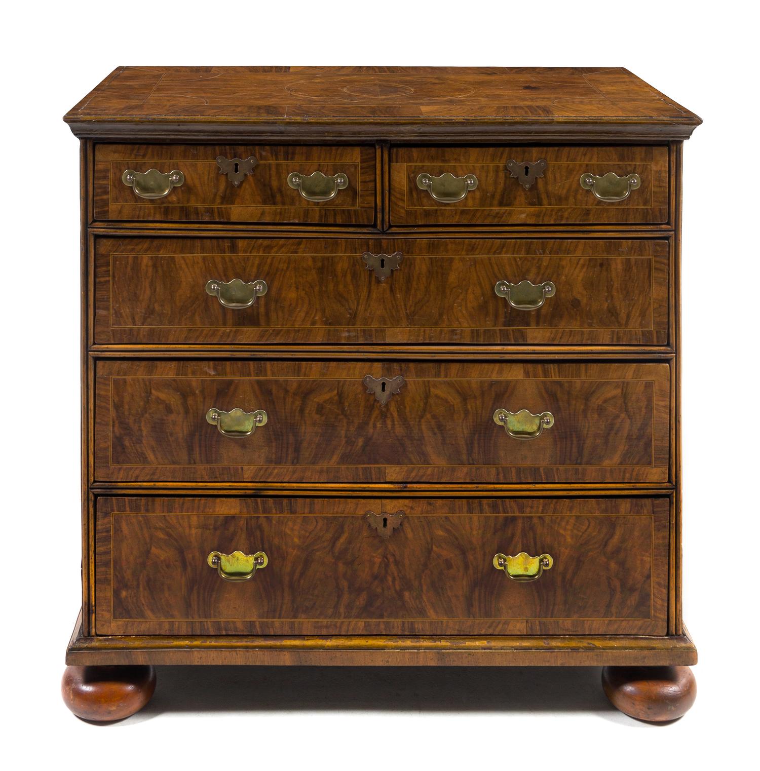 A Queen Anne Burlwood Chest of Drawers — EARLY 18TH CENTURY