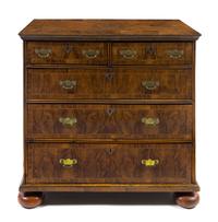 A Queen Anne Burlwood Chest of Drawers — EARLY 18TH CENTURY