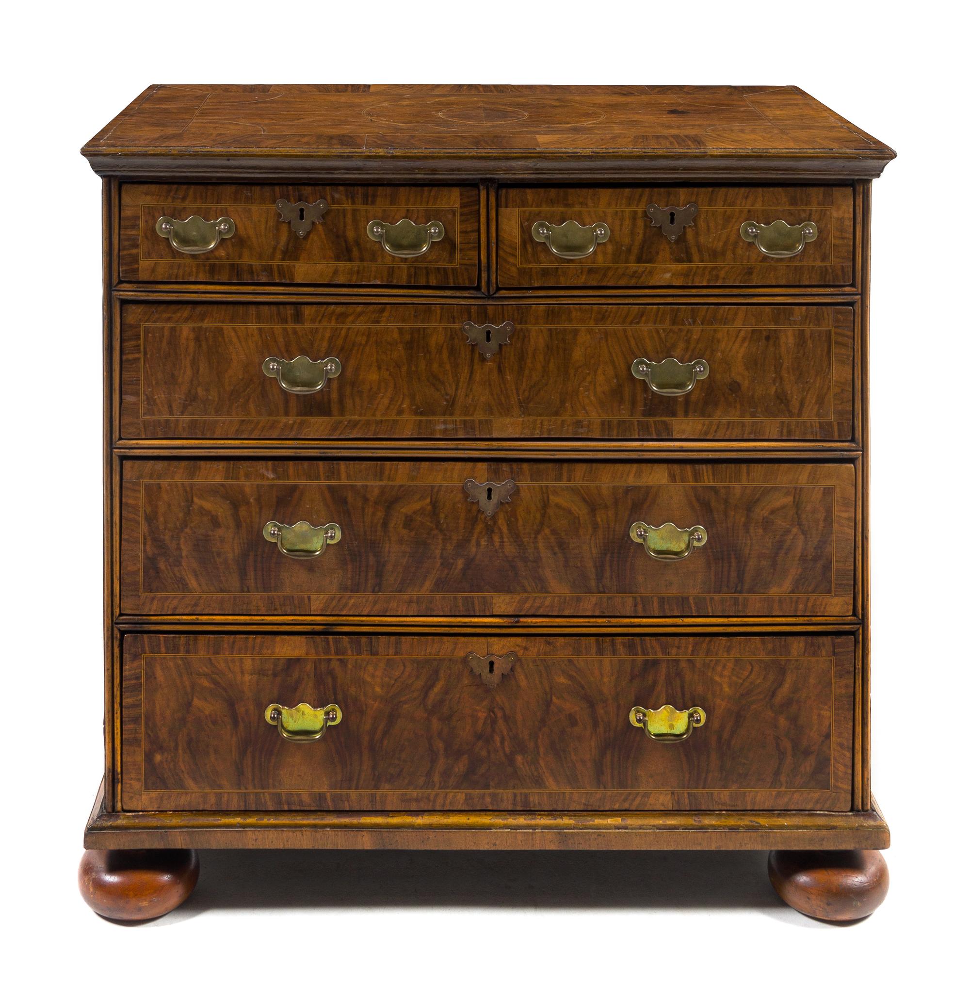 A Queen Anne Burlwood Chest of Drawers — EARLY 18TH CENTURY