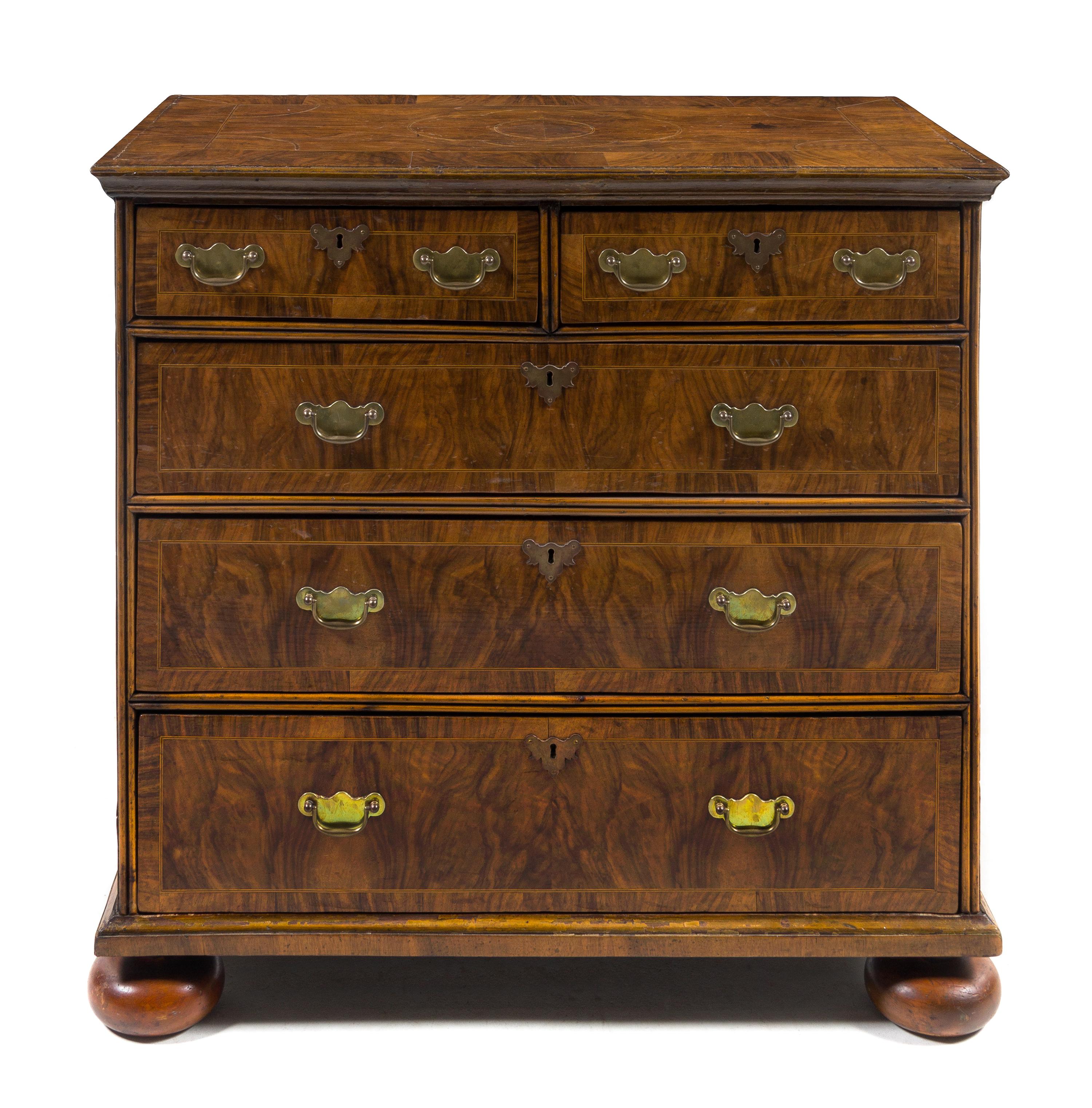A Queen Anne Burlwood Chest of Drawers — EARLY 18TH CENTURY