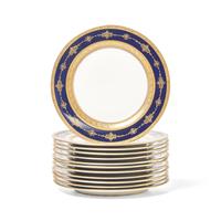 A Set of Twelve Limoges Cobalt Ground Parcel Gilt Dinner Plates