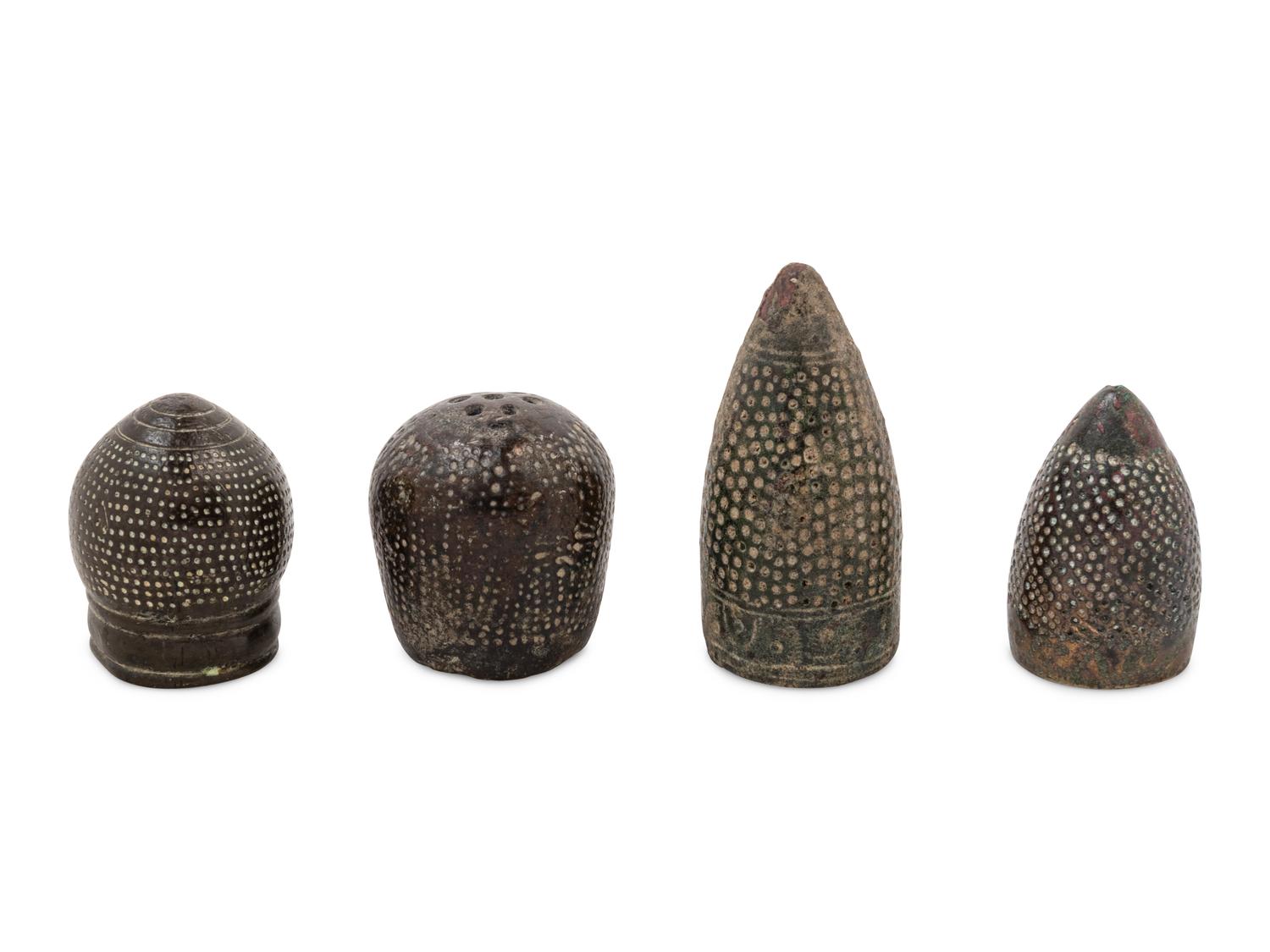 Four Ancient and Medieval Bronze Thimbles