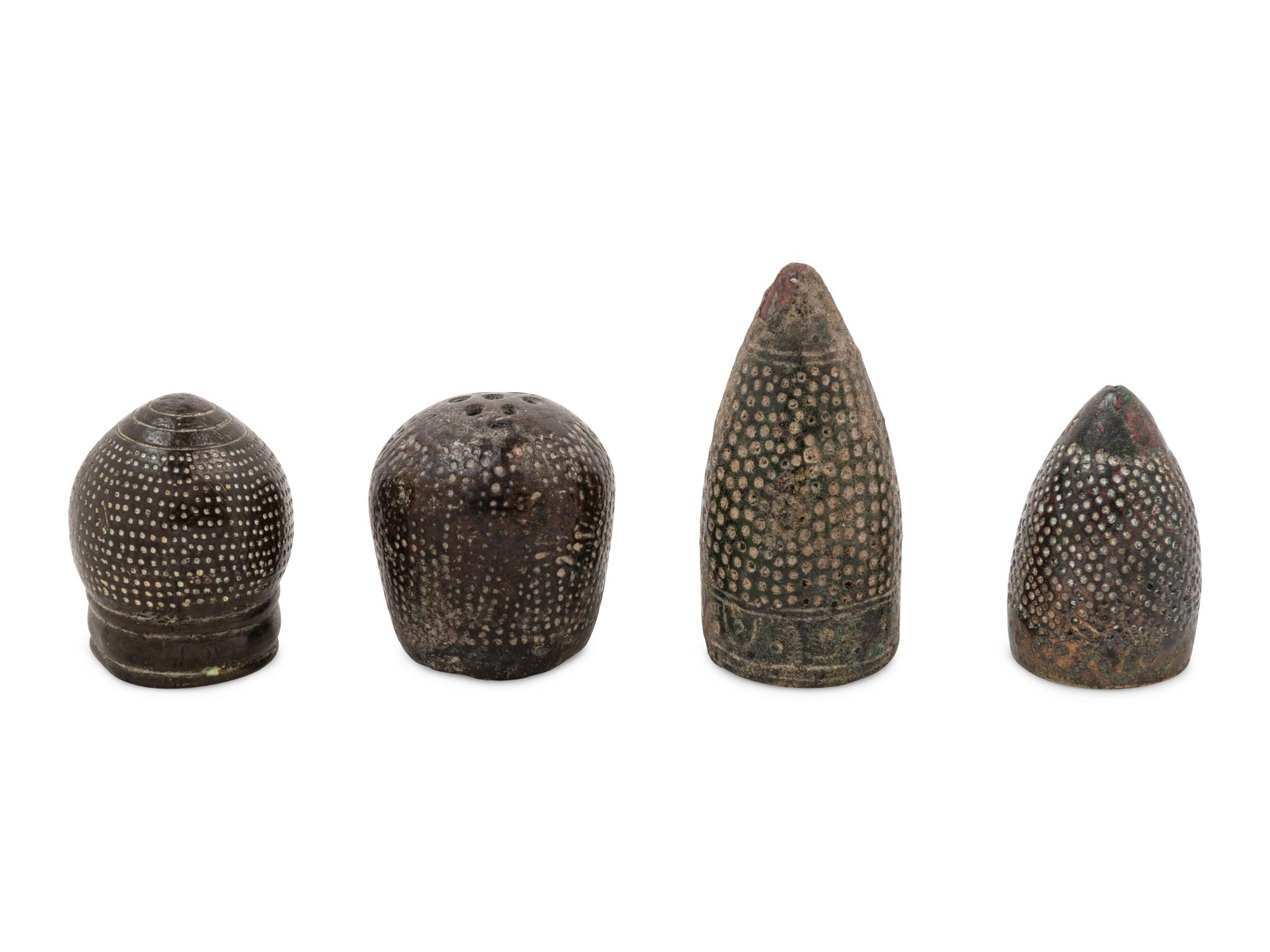 Four Ancient and Medieval Bronze Thimbles