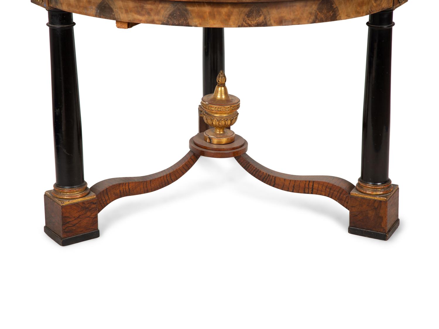 An Empire Style Parcel Ebonized Walnut Center Table — 19TH CENTURY