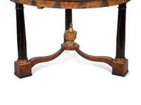 An Empire Style Parcel Ebonized Walnut Center Table — 19TH CENTURY