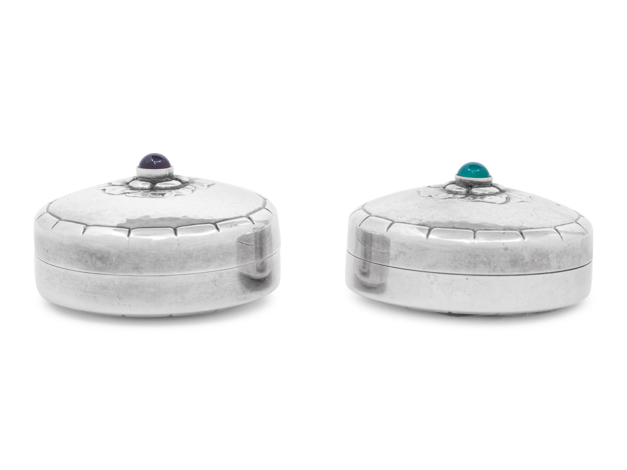 A Pair of Georg Jensen Silver and Hardstone Cabochon-Inset Pill Boxes