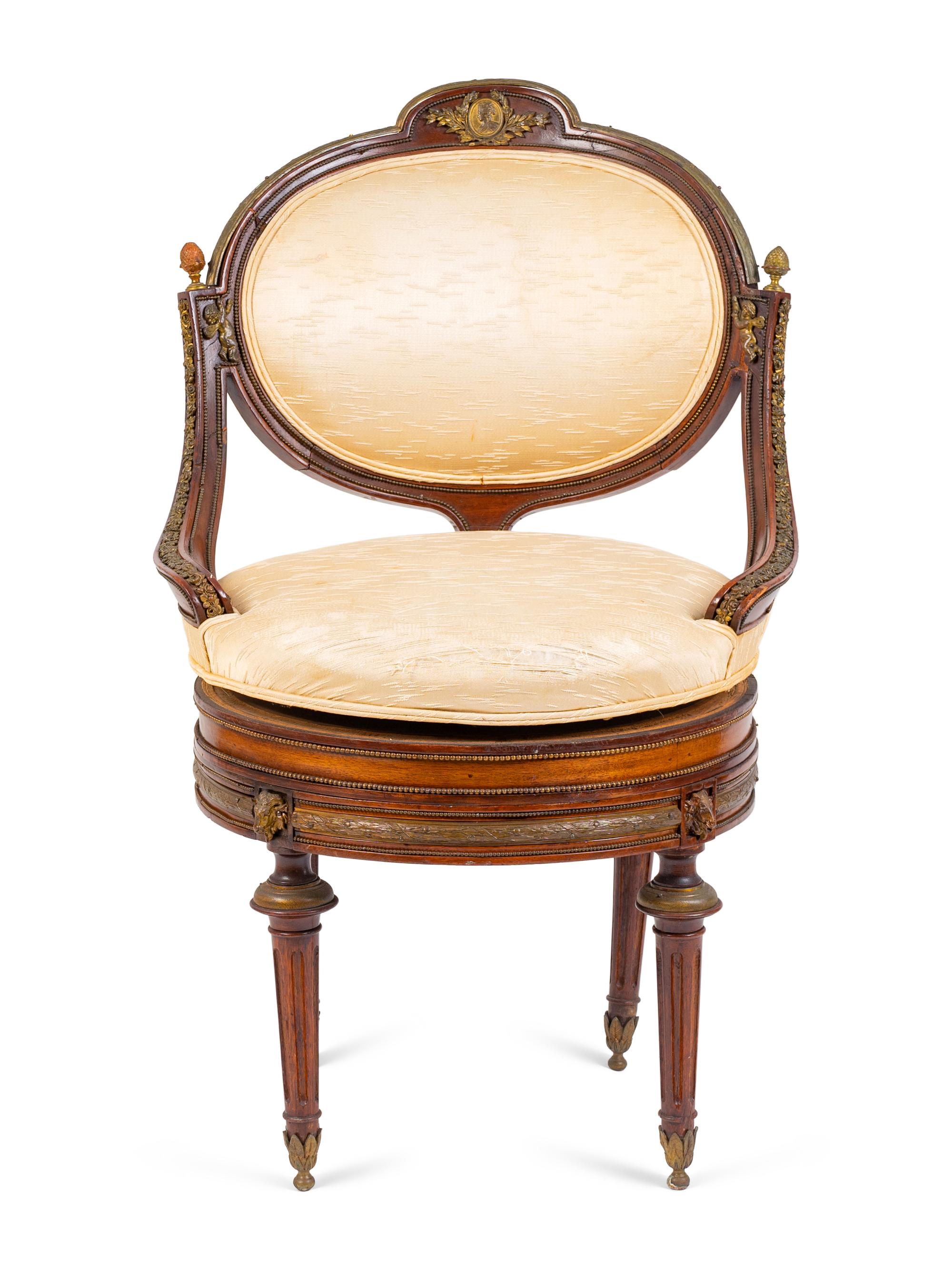 A Regency Style Gilt Metal Mounted Mahogany Swivel Chair — 19TH CENTURY