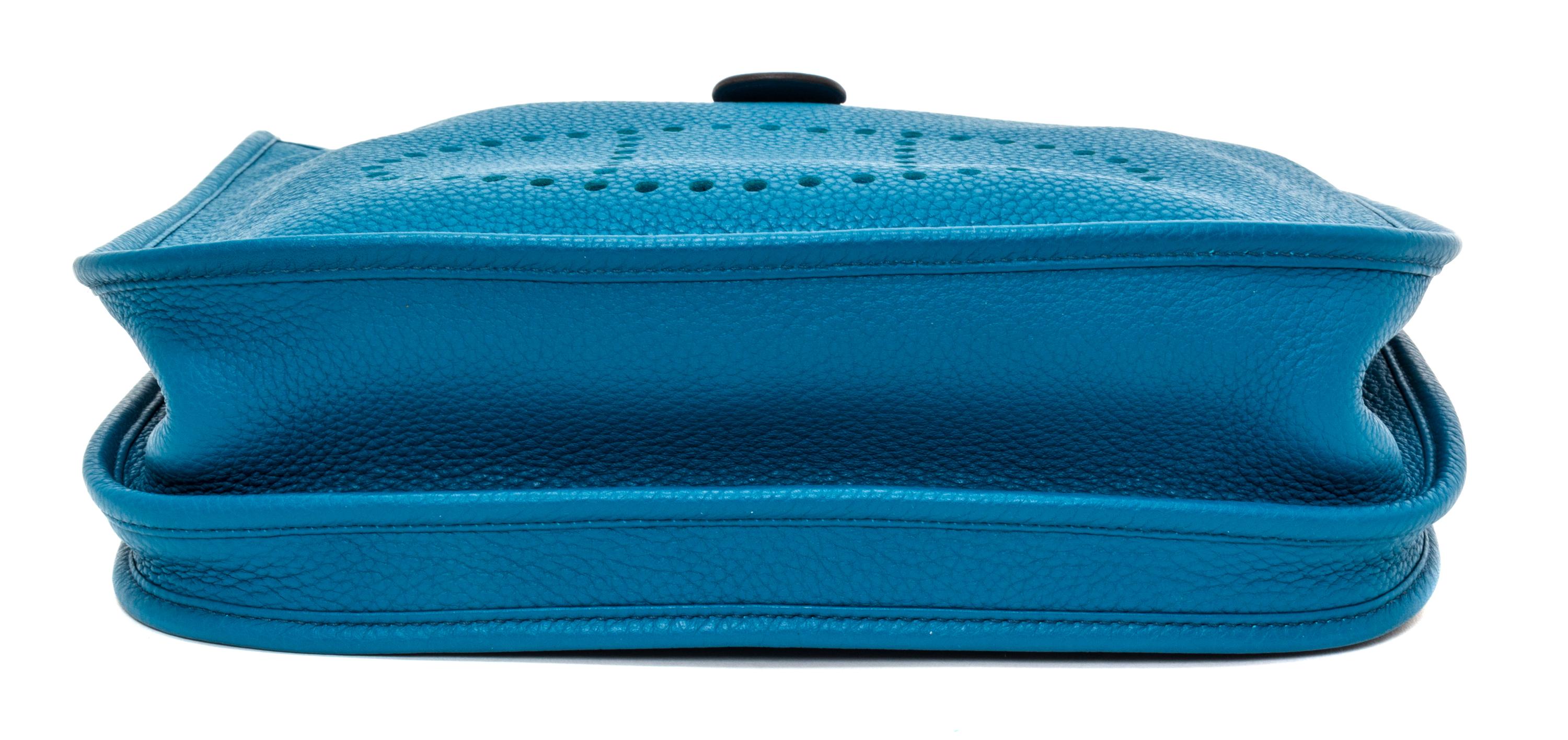 An Hermes Bleu Izmir Taurillon Clemence Evelyne III PM Handbag, 11.25" x 12" x 2.5".