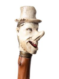 Three Carved Horn or Bone and Brass-Mounted Figural Canes