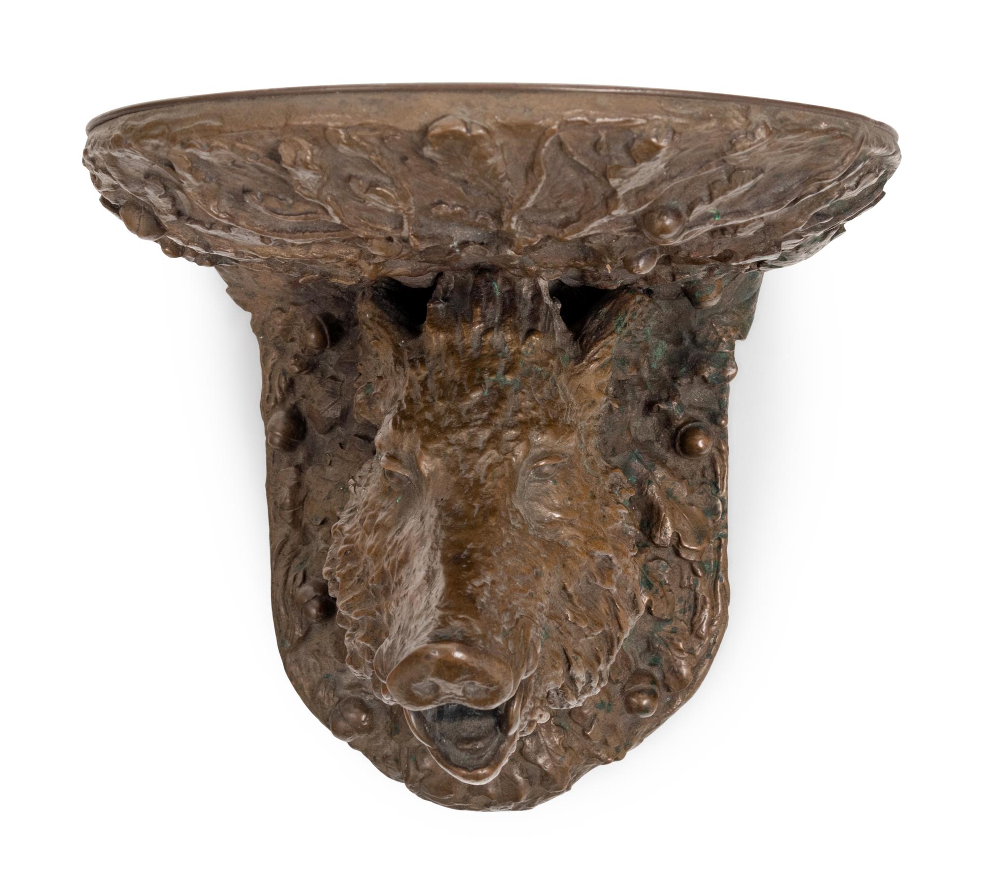 A Continental Cast Bronze Boar's Head Wall Bracket