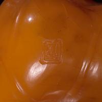 A Chinese 'Beeswax' Amber Lotus Pod and Leaf Pendant — 蜜蠟雕荷葉蓮蓬墜