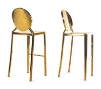A Pair of Gilt Decorated Steel Eclipse Bar Stools