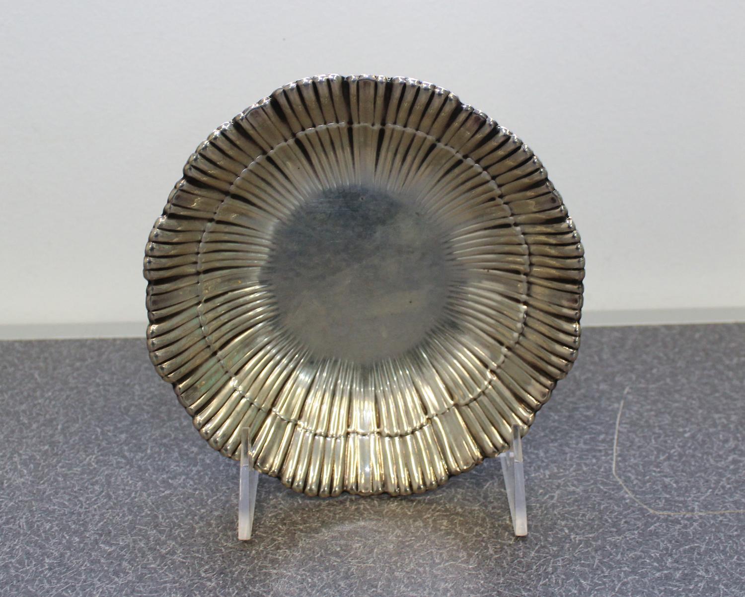 An American Silver Dish, Meriden Britannia Co., Meriden, CT, having a ribbed, scallop form border.