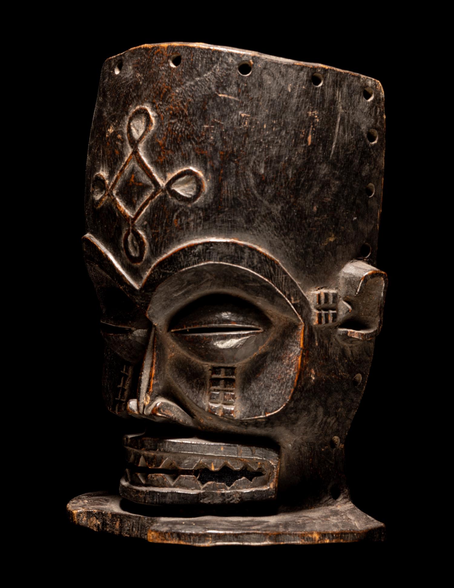 A Chokwe Wood Helmet Mask