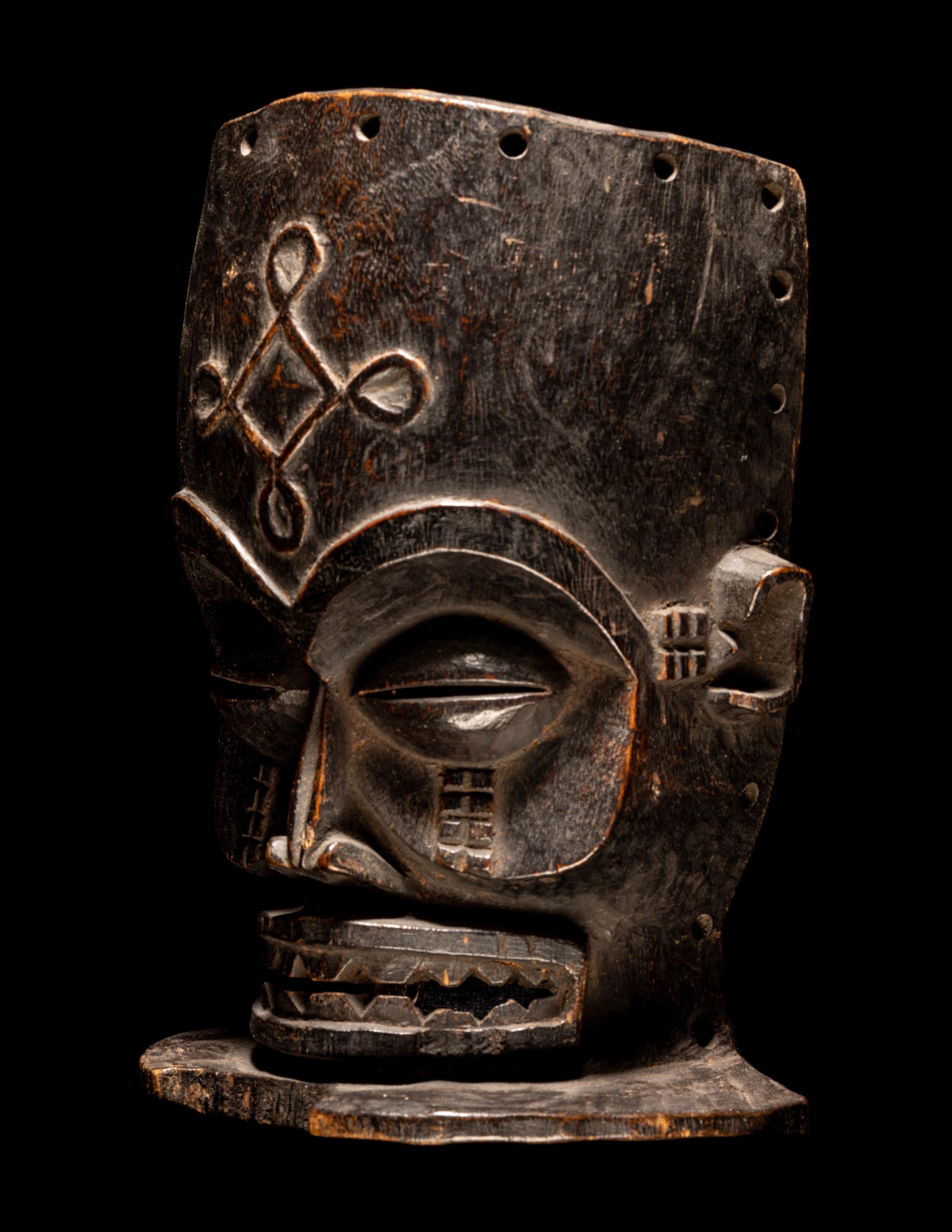 A Chokwe Wood Helmet Mask