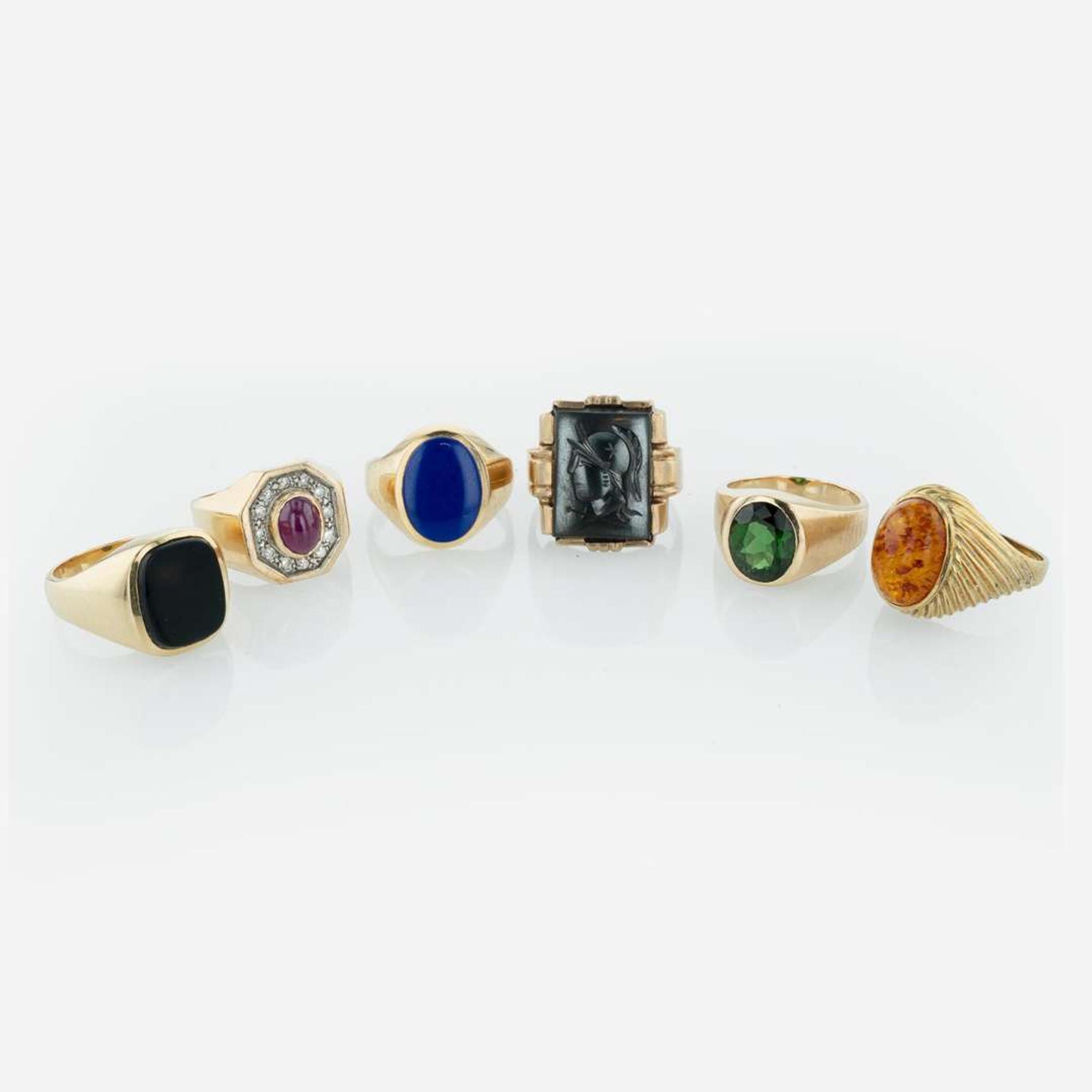 A Collection of Six Yellow Gold Men's Rings