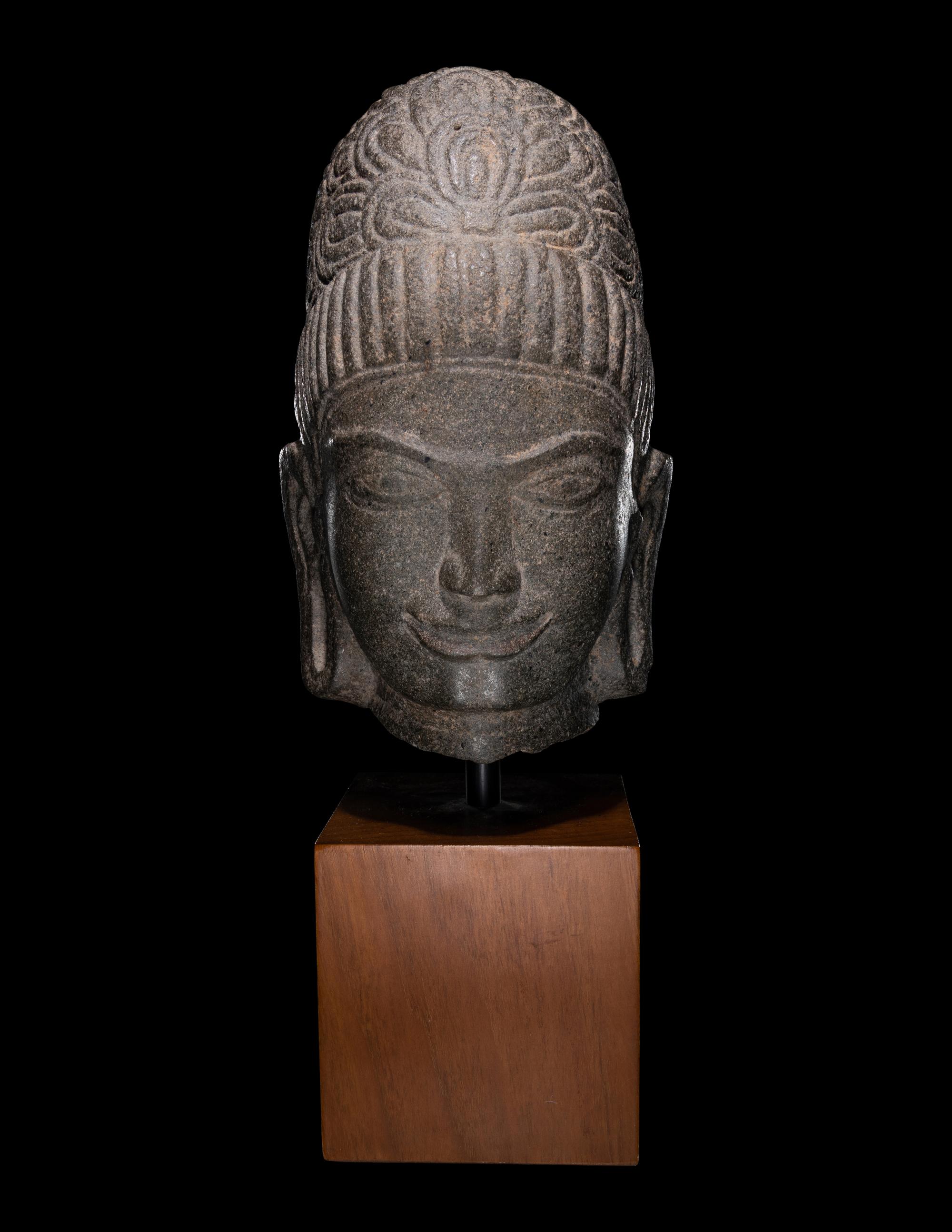 A Khmer Stone Head of Deity