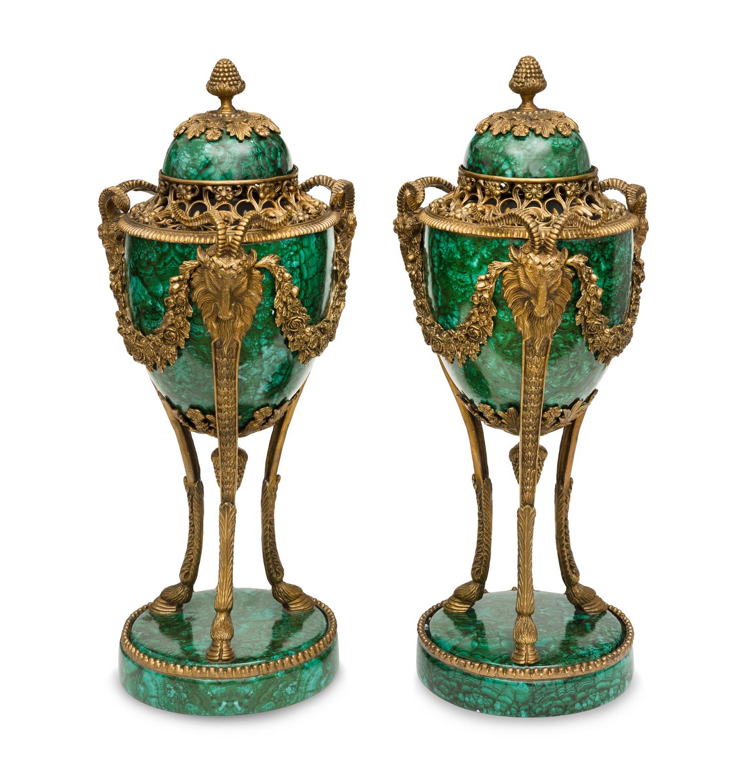 A Pair of Continental Rococo Style Parcel Gilt Bronze Figural Fruit Baskets