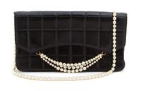 A Chanel Black Leather Quilted Flap Handbag, 10.25" x 5.75" x 2.5".